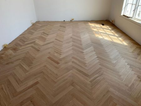 custom herringbone hardwood floor installation - finished