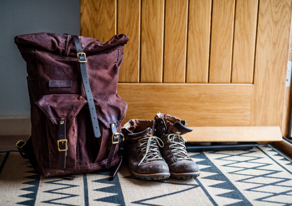boots and backpack left at the front door