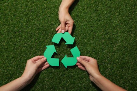 Material recycling sign representing eco-friendly flooring