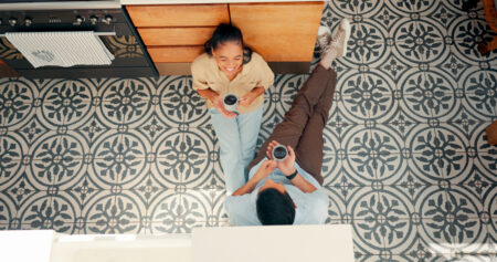 coffee-talking-and-a-couple-at-home-with-love-ca-2024-04-11-20-41-36-utc Man and woman sitting on the floor