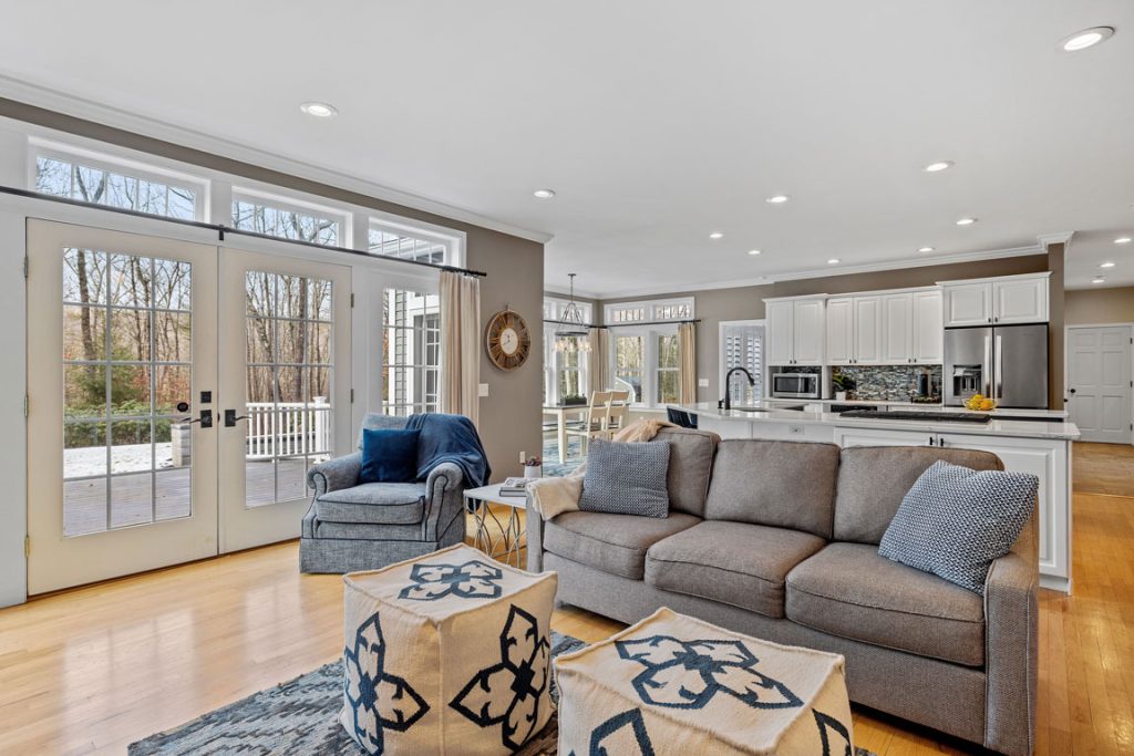 closeup-shot-of-the-interior-of-a-modern-living-room open-concept home with wooden flooring